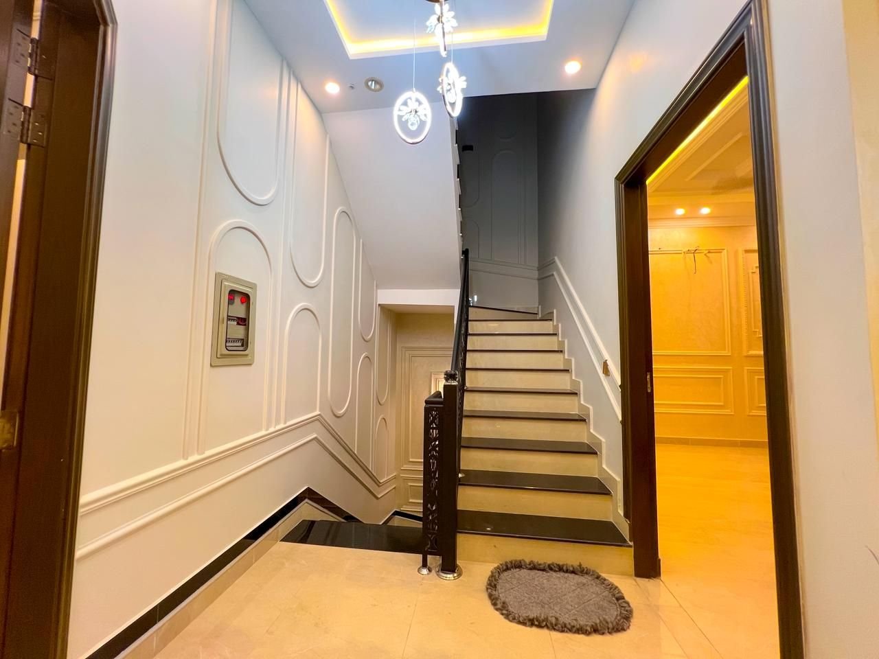 Staircase with chandelier