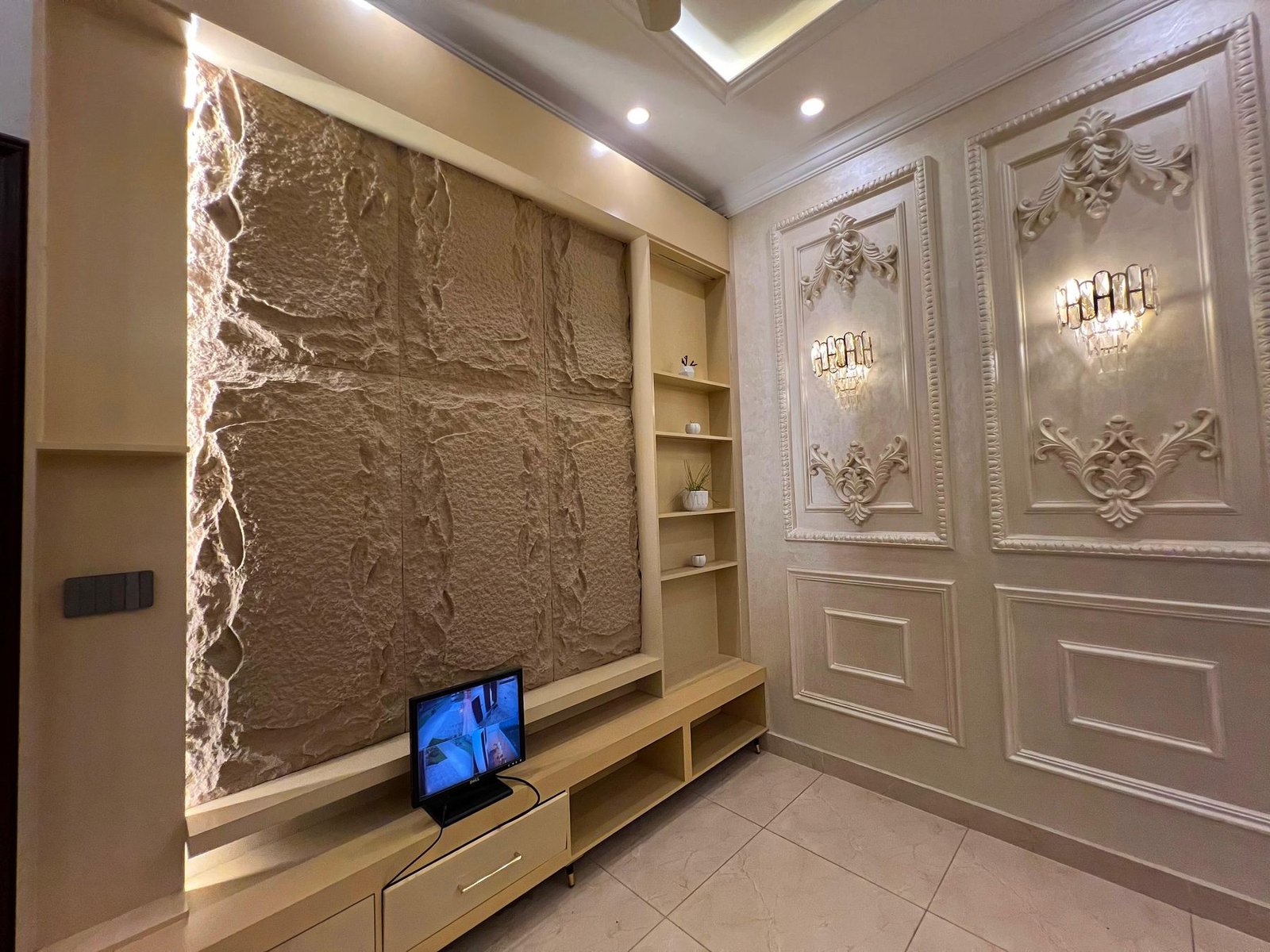 TV lounge with stone feature wall
